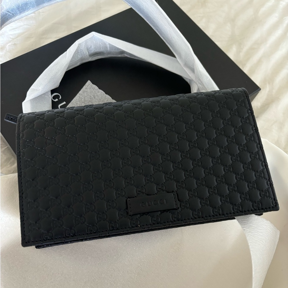 Brand new Gucci clutch crossbody with a box and packaging